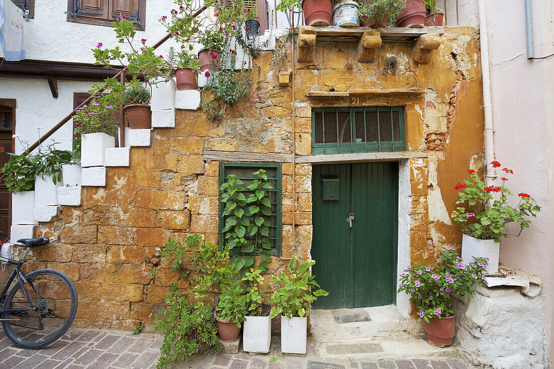 Colourful Local House With Pot Plants In The Backstreets Of The Old Town