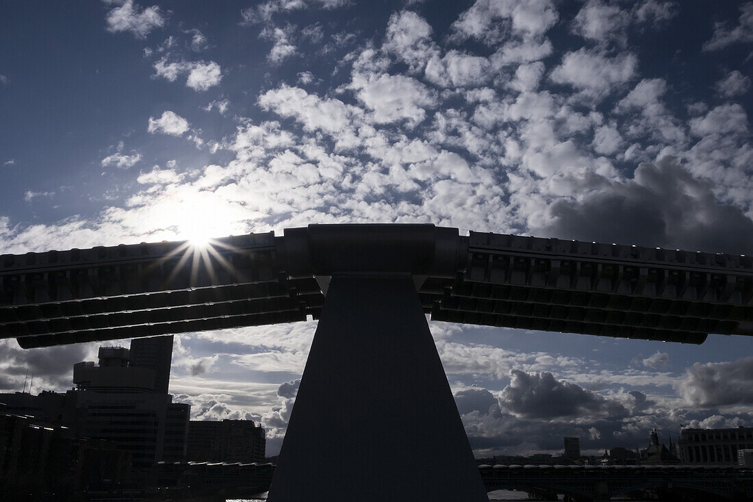 A Silhouetted View From Millennium Bridge Against A Dramatic Spring Sky; London, England