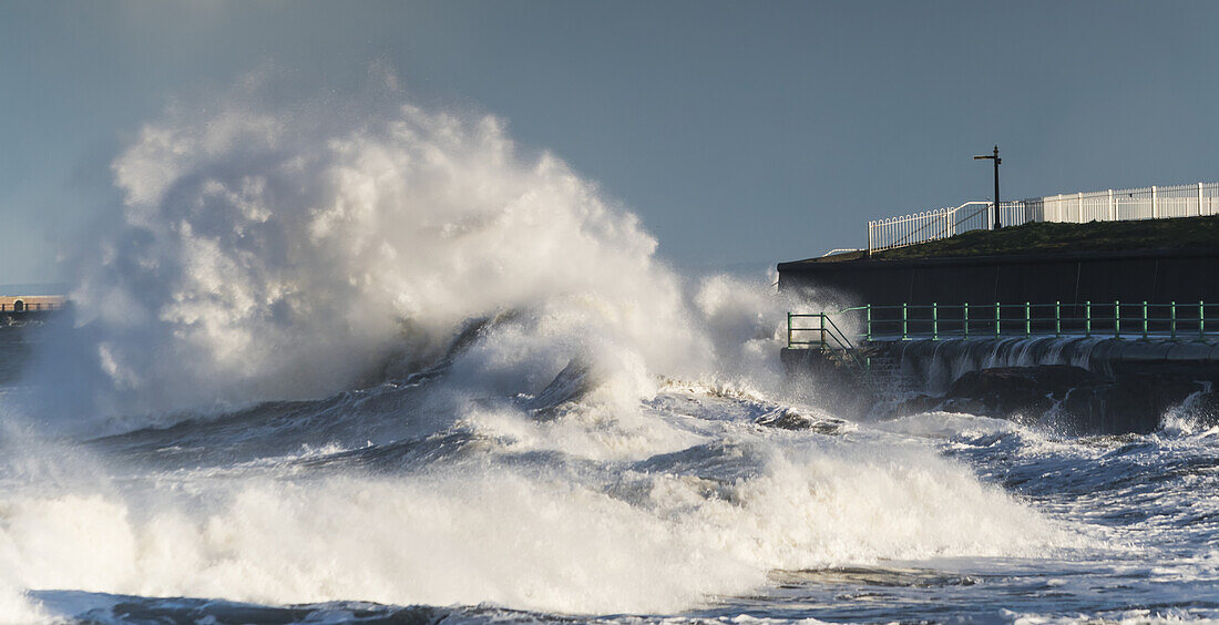 A Large Wave Breaks And Crashes Against The Shore; Sunderland, Tyne And Wear, England