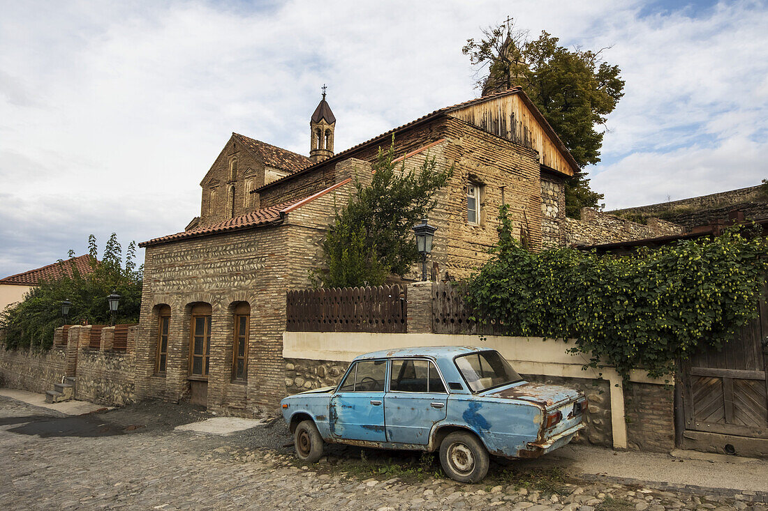 Lada Parked By The Church Of St. George; Sighnaghi, Kakheti, Georgia