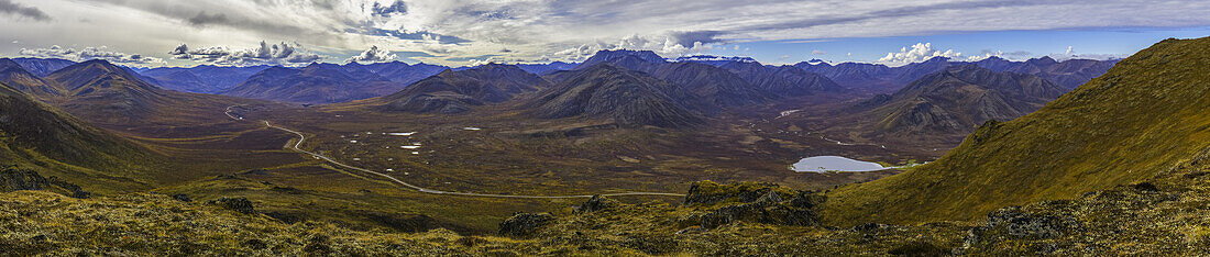 Panoramic Image Of The Landscape In Autumn Colours Along The Dempster Highway; Yukon, Canada