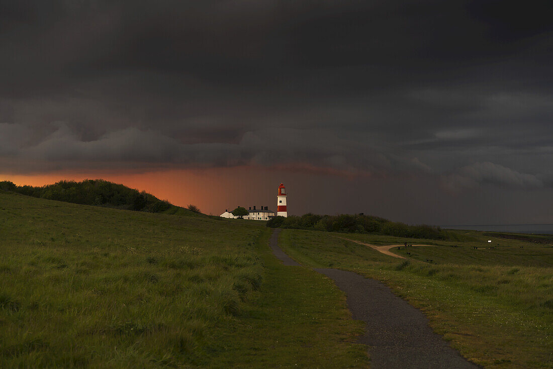 Souter Lighthouse Along The Coast Under Ominous Storm Clouds; South Shields, Tyne And Wear, England