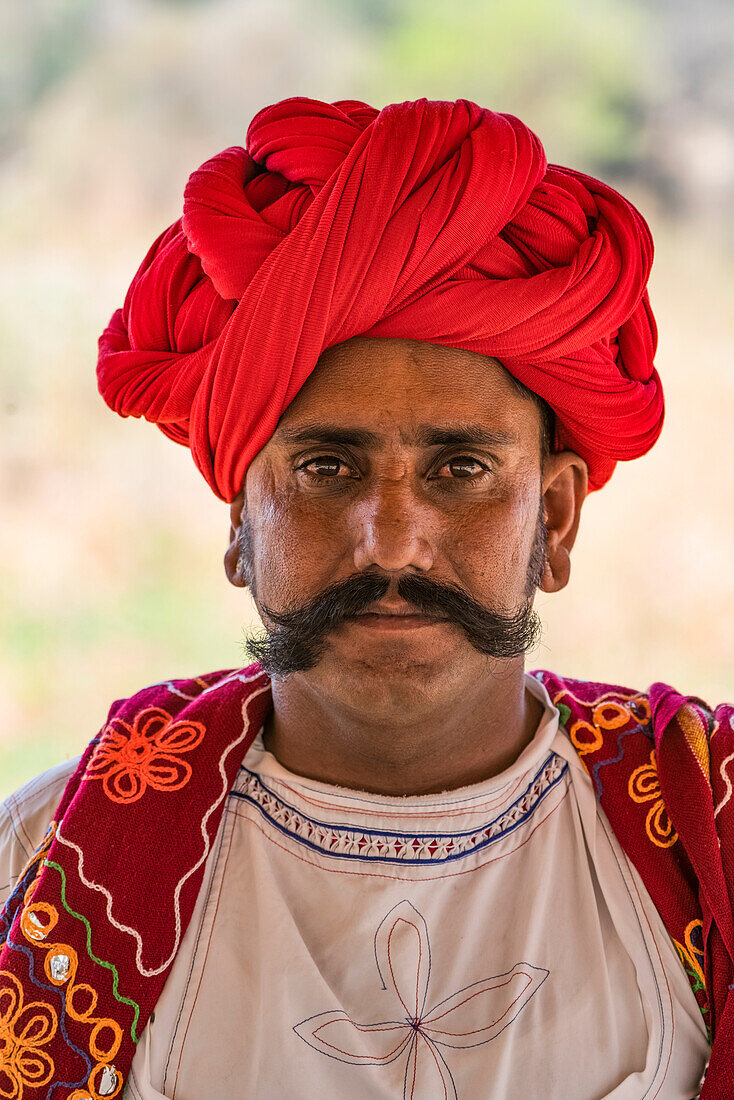 The traditional head wear and clothing by the men in the Jawai region of Northern India; Rajasthan, India