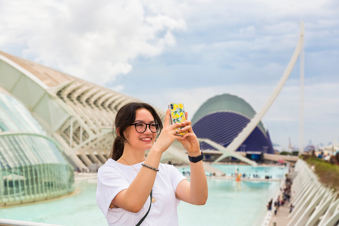 Young female tourist at City of Arts and Sciences; Valencia, Spain