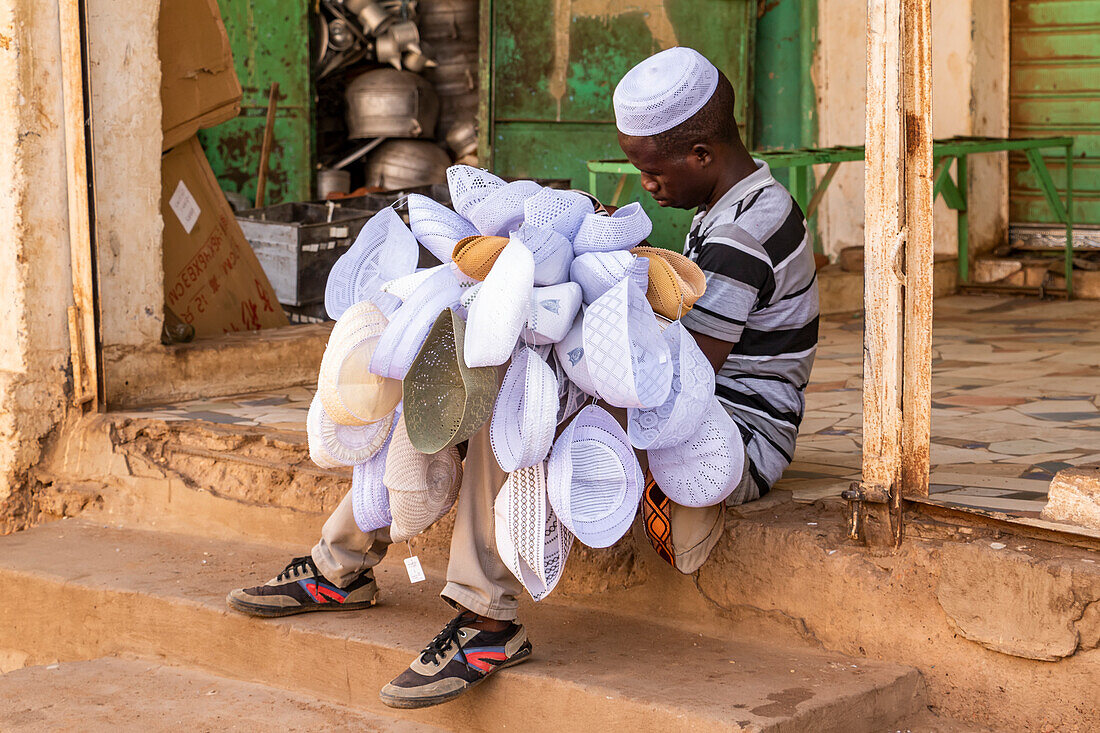 Sudanese hat seller at the Omdurman Market; Omdurman, Khartoum, Sudan