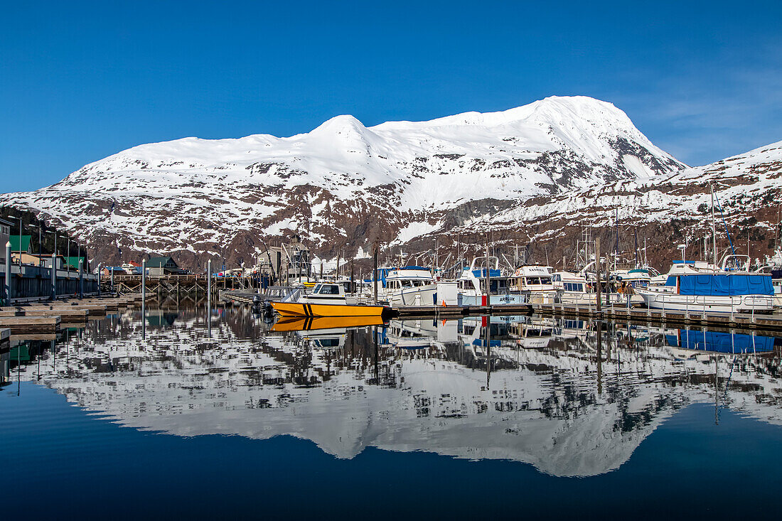 Small boat harbour with beautiful reflection in the water, South-central Alaska; Whittier, Alaska, United States of America