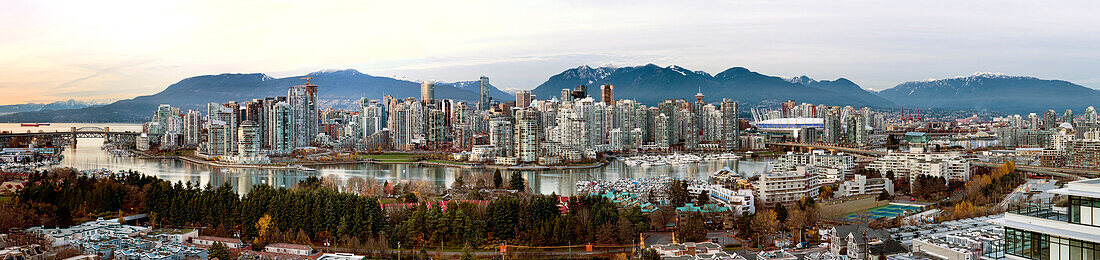 Panoramic cityscape of Vancouver, BC at dusk; Vancouver, British Columbia, Canada