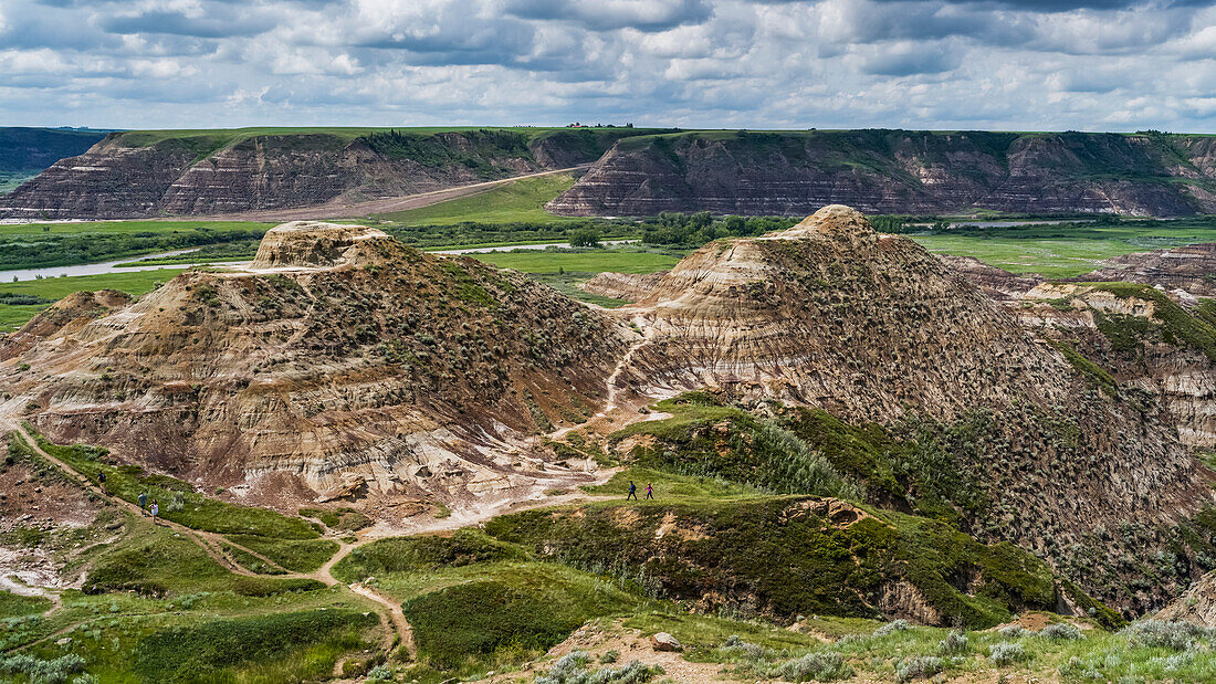 Tourists on a trail in Horse Thief Canyon, Starland County; Alberta, Canada