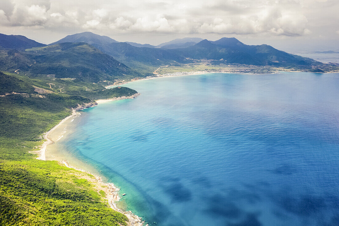 Drone view of Ninh Van along the coastline; Ninh Van, Khanh Hoa Province, Vietnam