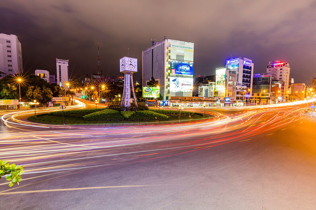 Light trails and glowing lights, Dien Bien Phu roundabout; Ho Chi Minh City, Vietnam