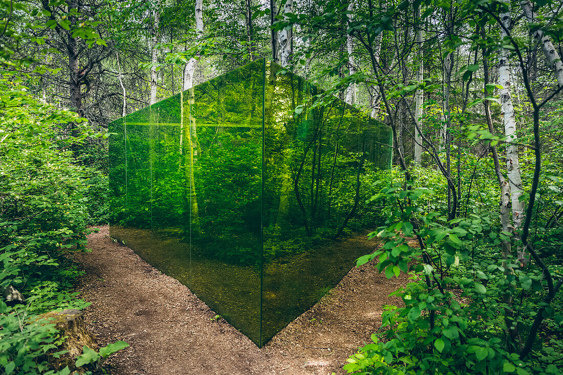 Art installation of green glass walls in a forest, Reford Gardens; Price, Quebec, Canada