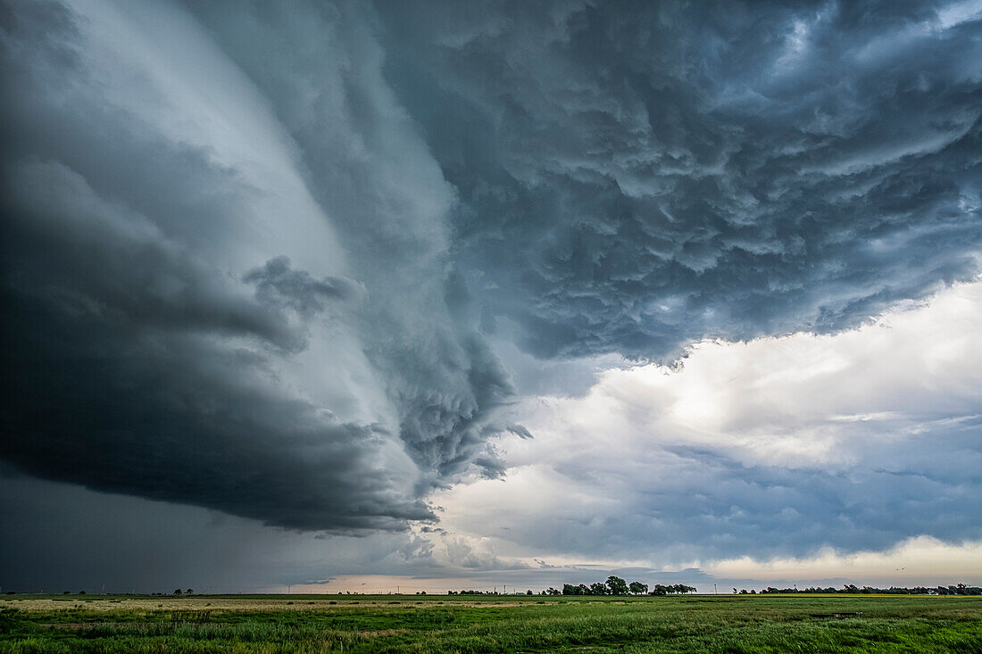 Supercell thunderstorm clouds show off the power of mother nature. Massive clouds build and unleash powerful storms creating a beautiful and awe inspiring spectacle; Colorado, United States of America
