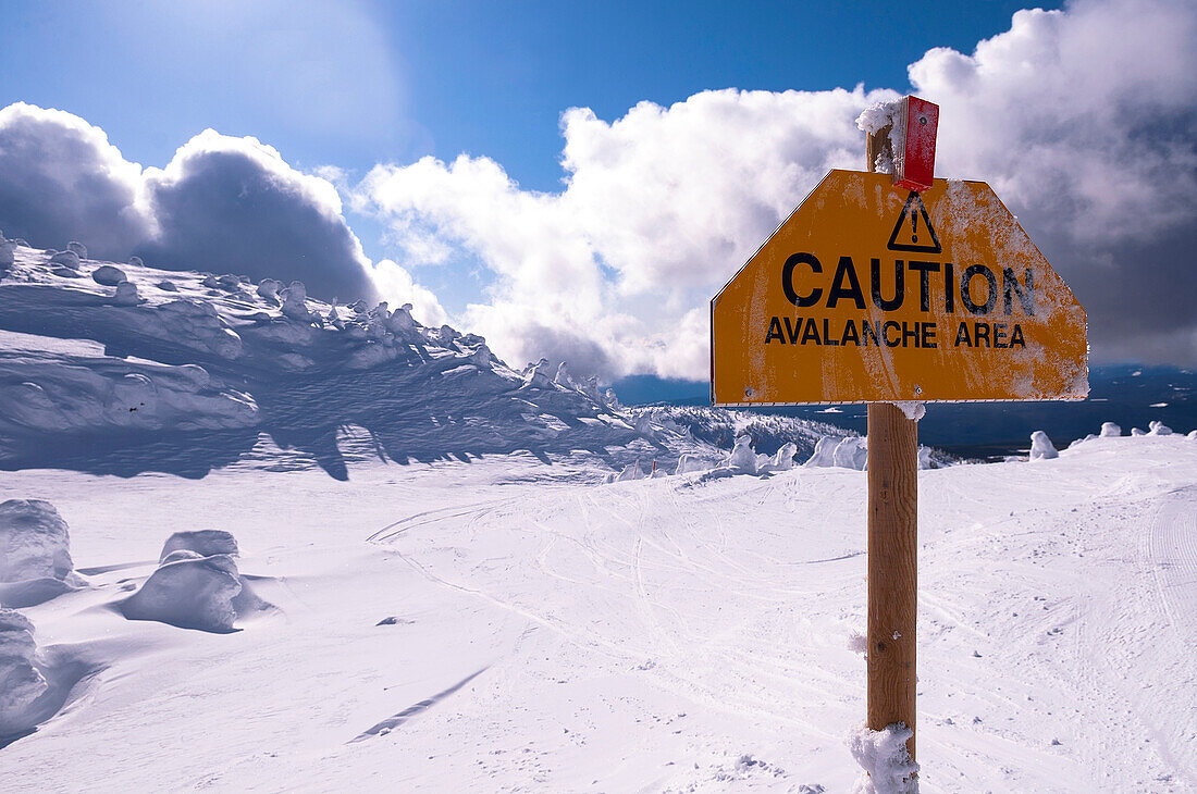 Caution sign on Big White Mountain, Kelowna, British Columbia, Canada