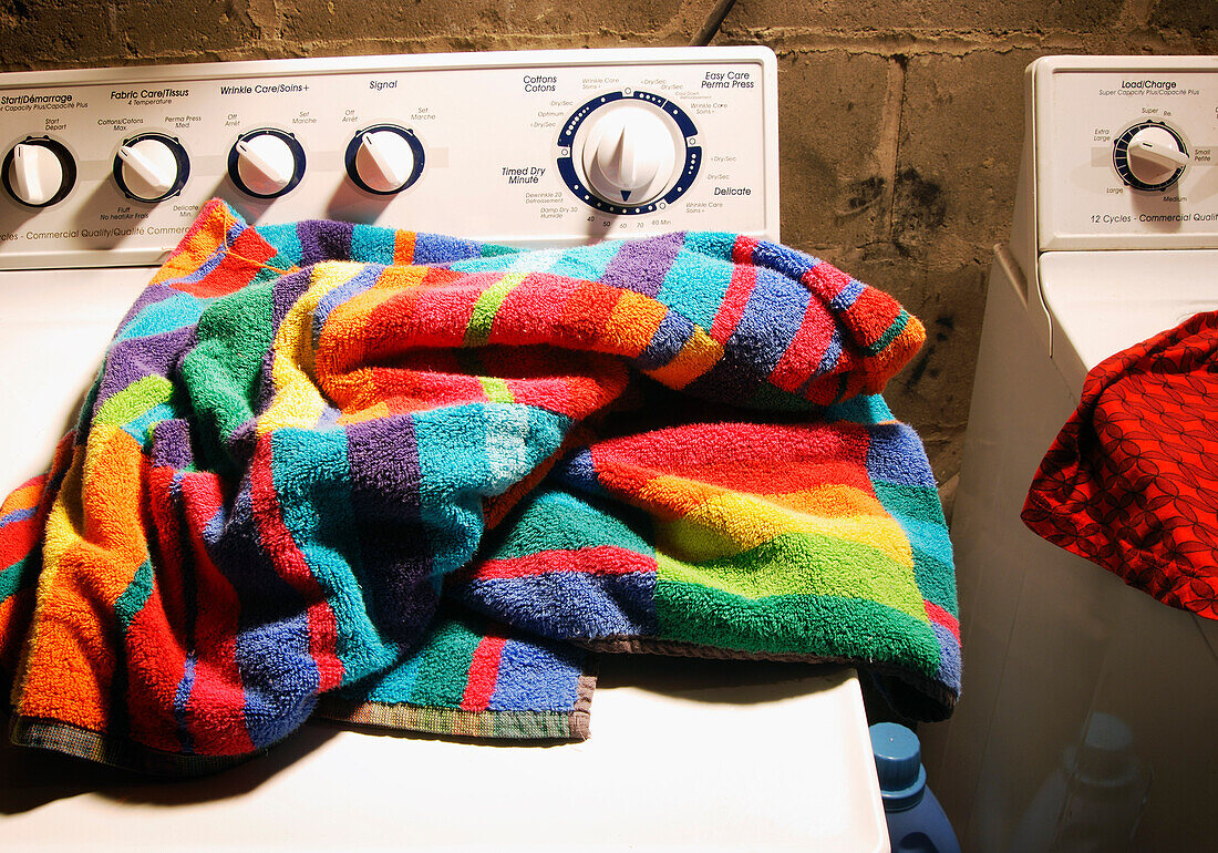 Towel and Dryer in Laundry Room
