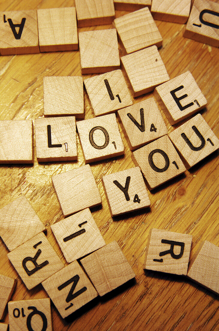 Board Game Pieces Spelling Out I Love You