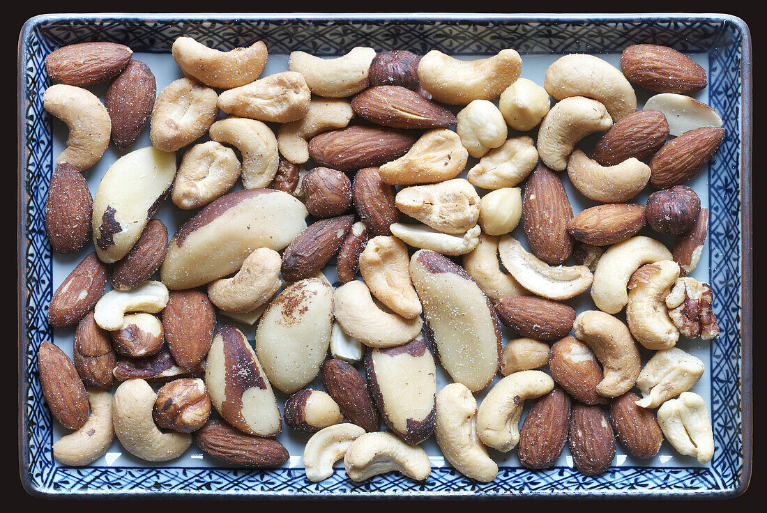 Rectangular plate with roasted, salted nuts