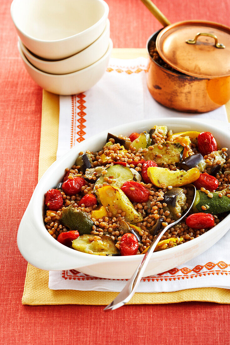 Wheat Berries and Vegetables in Casserole Dish, Studio Shot