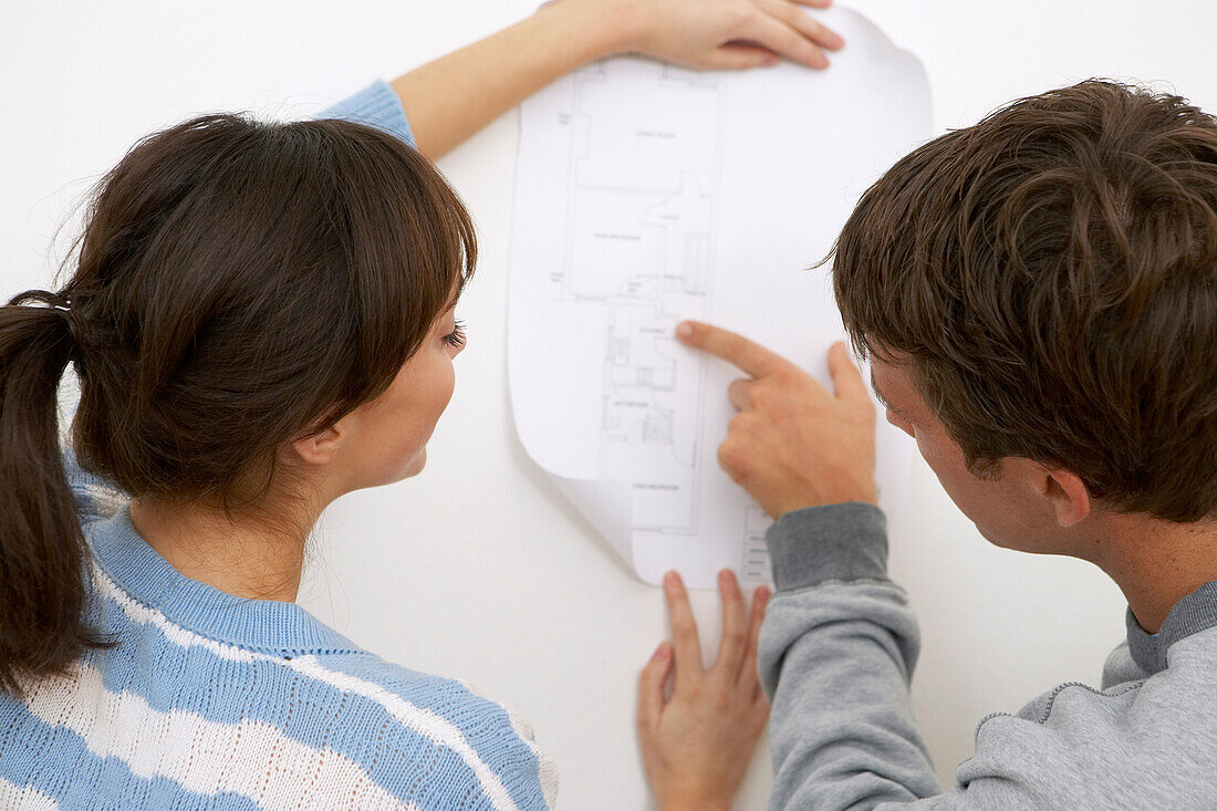 Couple Looking at Building Plans