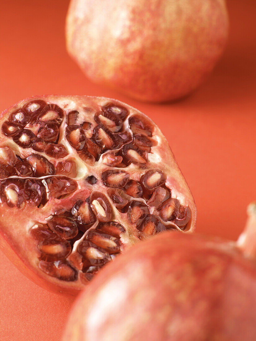 Close-up of Pomegranate Cut in Half, Studio Shot
