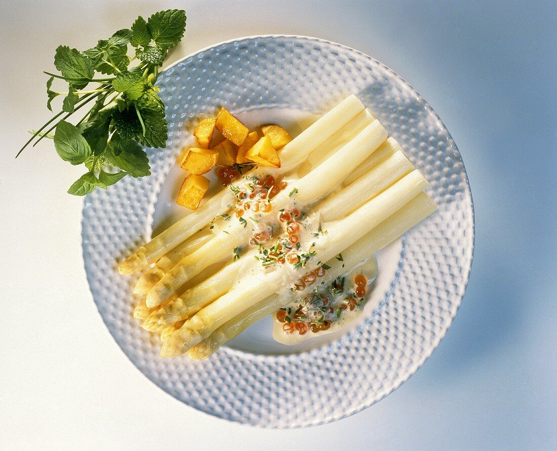 White asparagus with egg and caviare sauce & fried potatoes