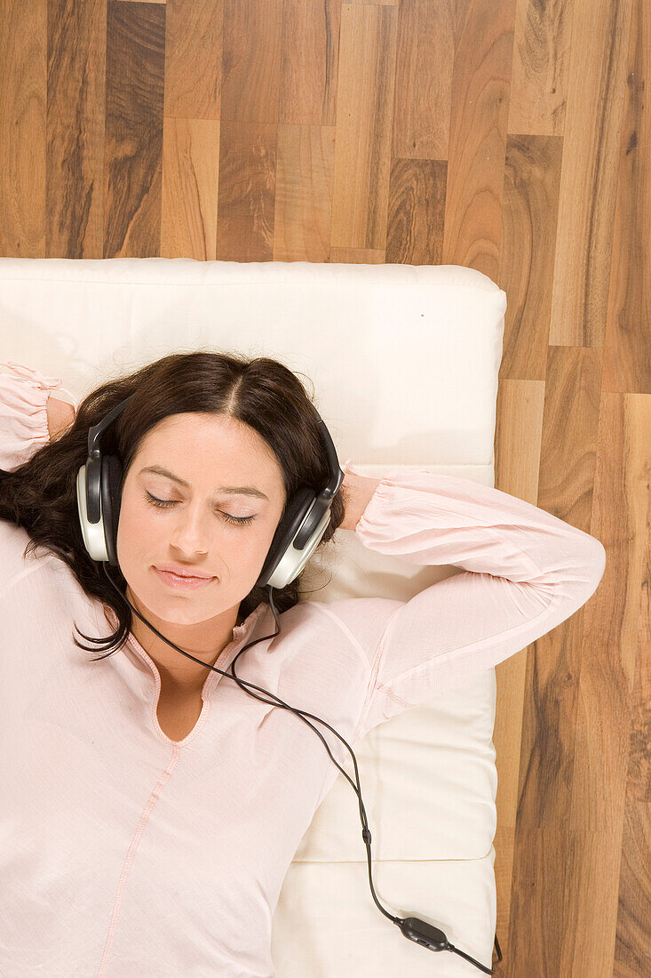 Woman Listening to Music with Headphones