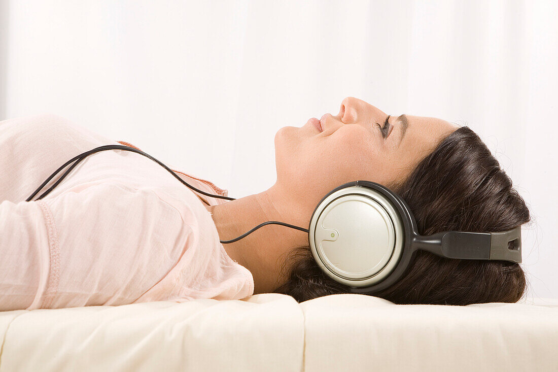 Woman Listening to Music with Headphones