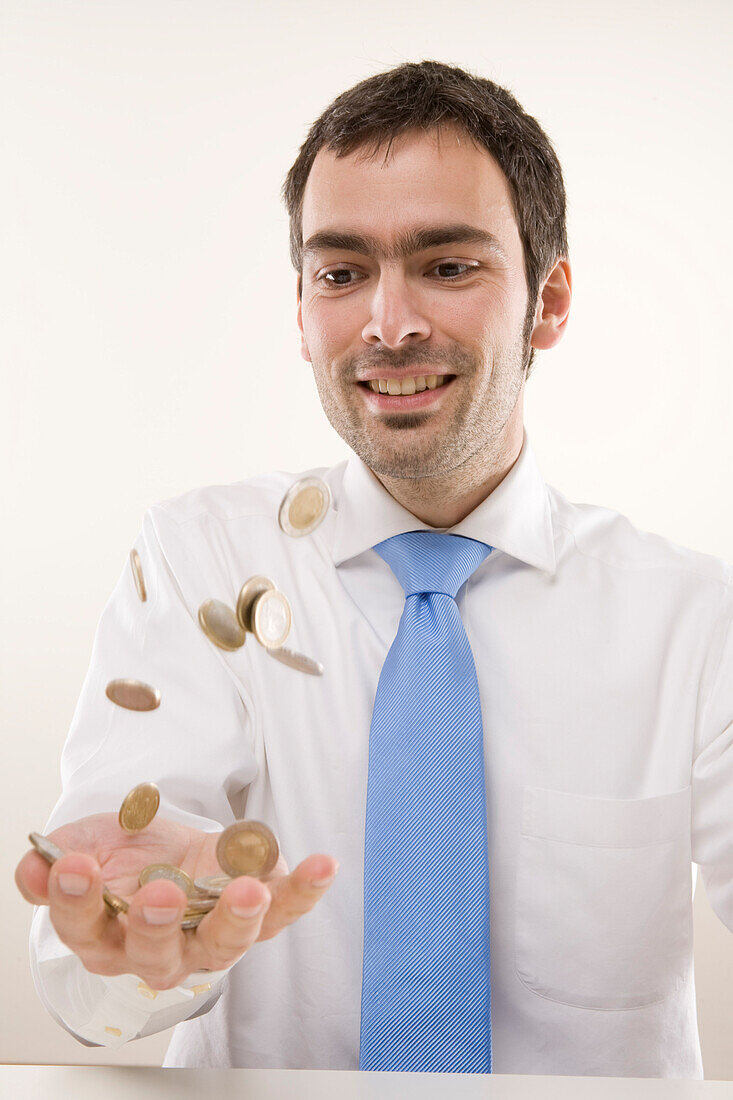 Man Tossing Coins