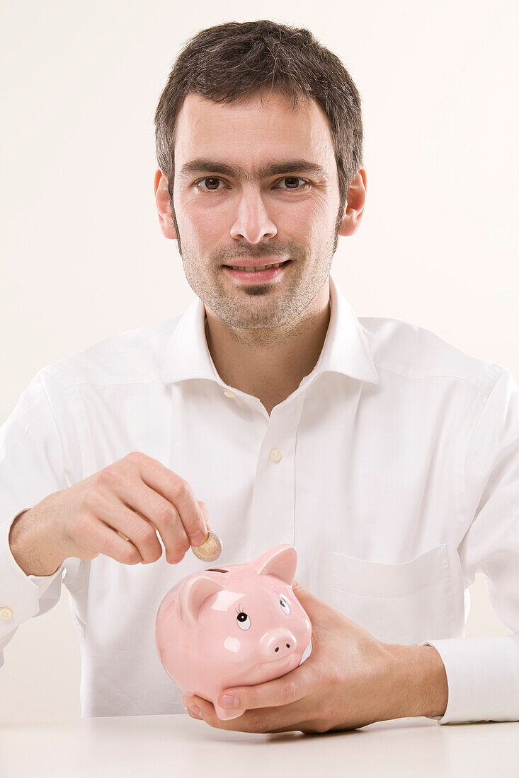 Man with Piggy Bank