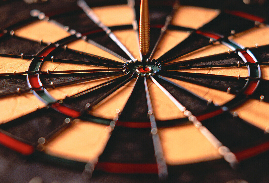 Close-Up of Dart in Bull's-Eye on Dartboard