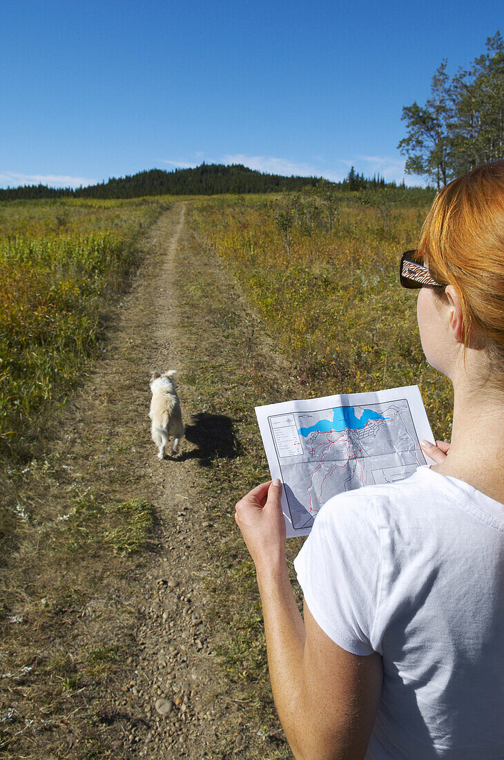 Hiker Looking at Map