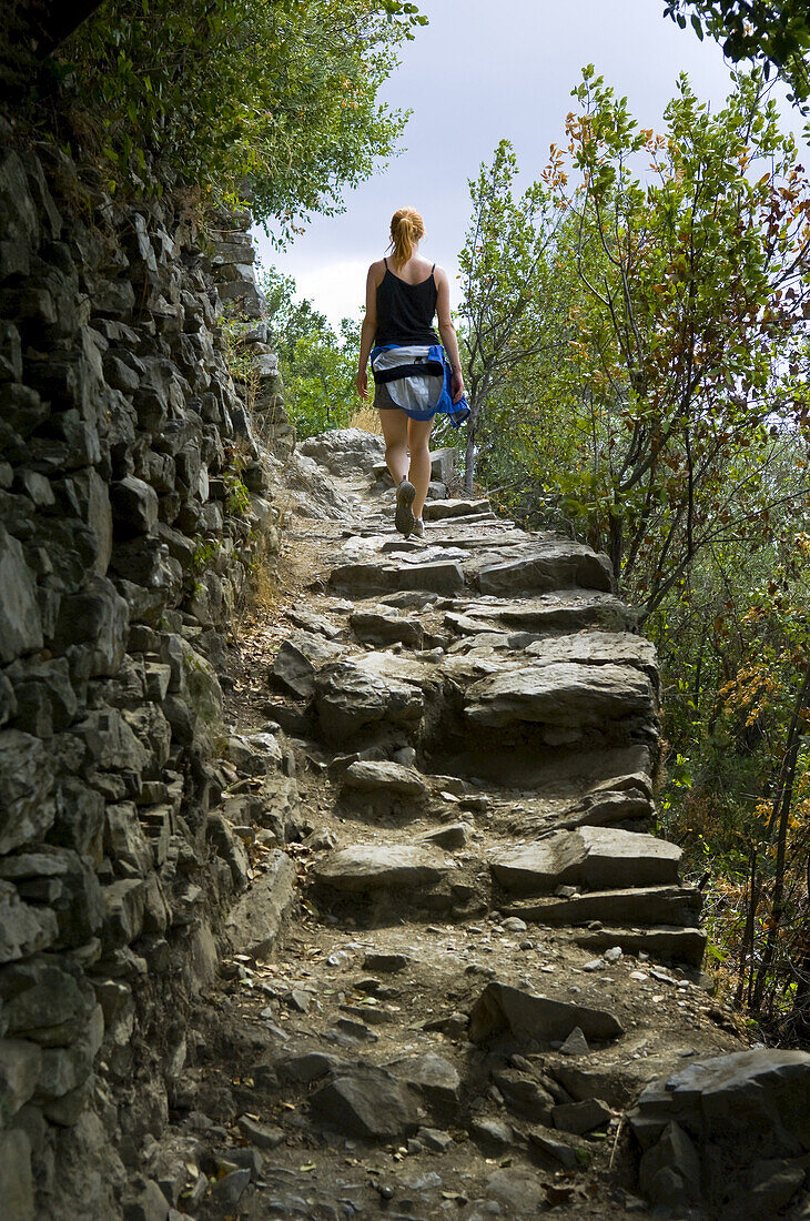 Woman Walking on Path, Cinque Terre, Liguria, Italy