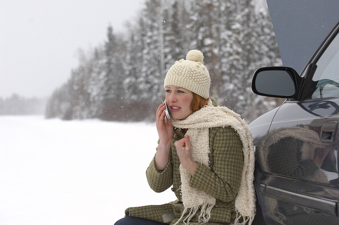 Woman Using Cellular Telephone Outdoors