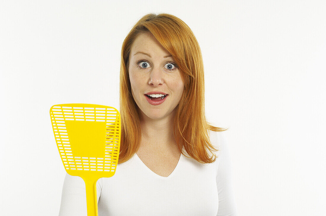 Woman Holding Fly Swatter