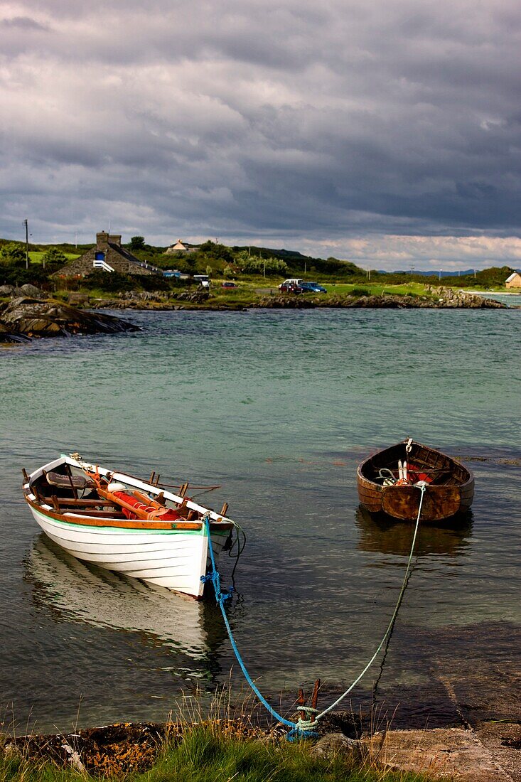 Isle Of Gigha, Scotland; Rowboats Tied To Shore