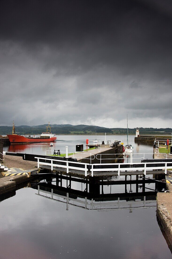 Scotland; Waterfront With Freighter In Background