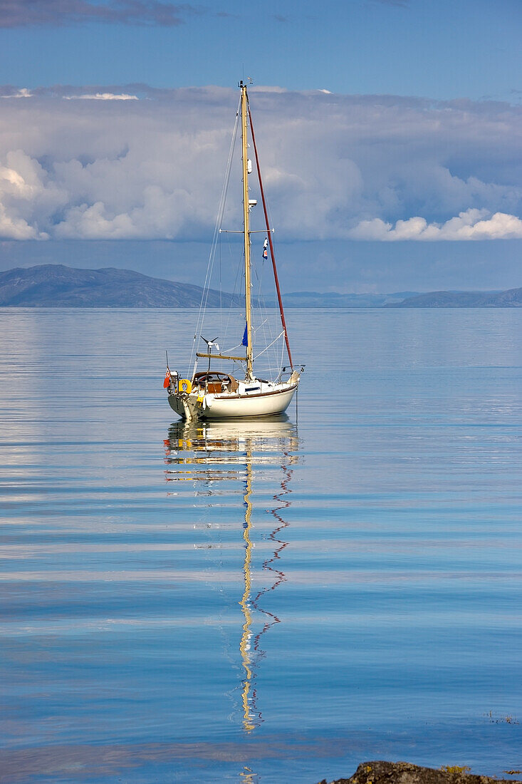 Isle Of Colonsay, Scotland; Sailboat On The Ocean