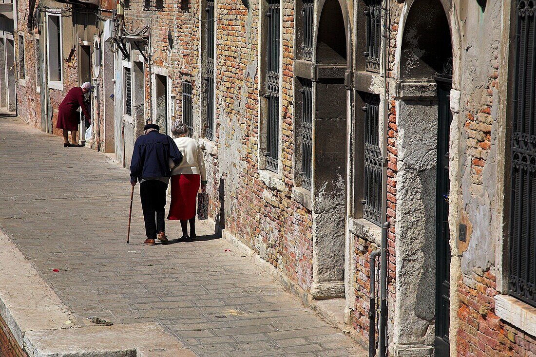 Old Buildings And People; Venice, Italy