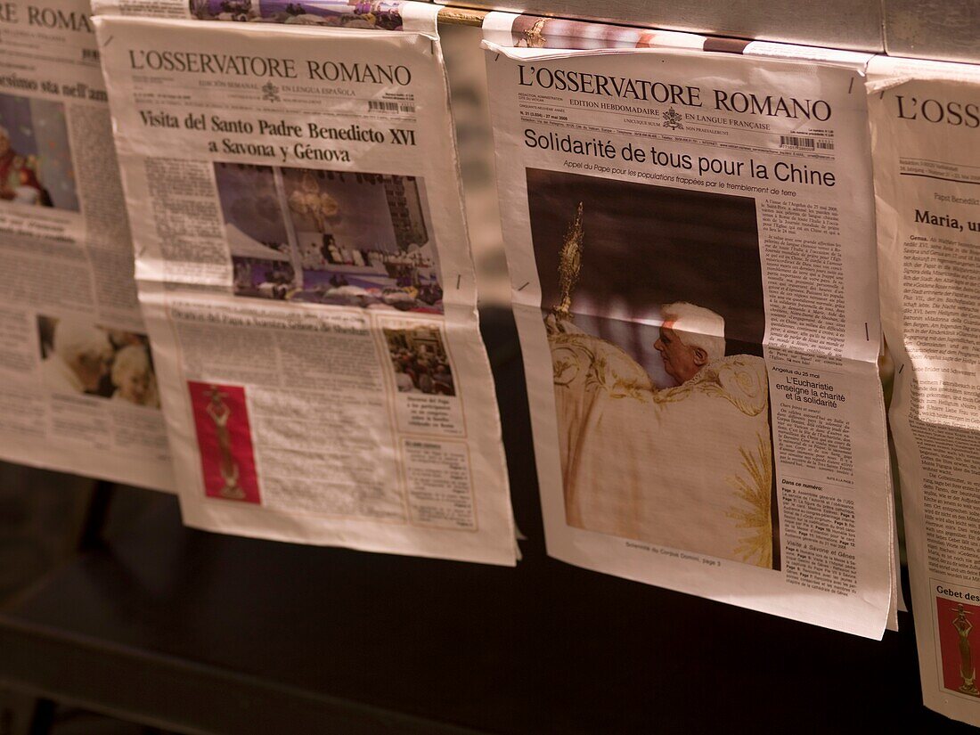 Newspapers Hanging On String On Saint Peter's Square; Rome, Italy