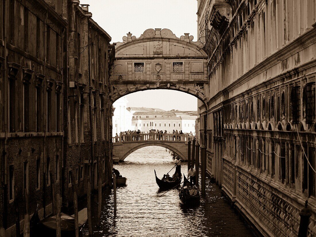 Gondola's Floating Under The Bridge Of Sighs; Venice, Italy
