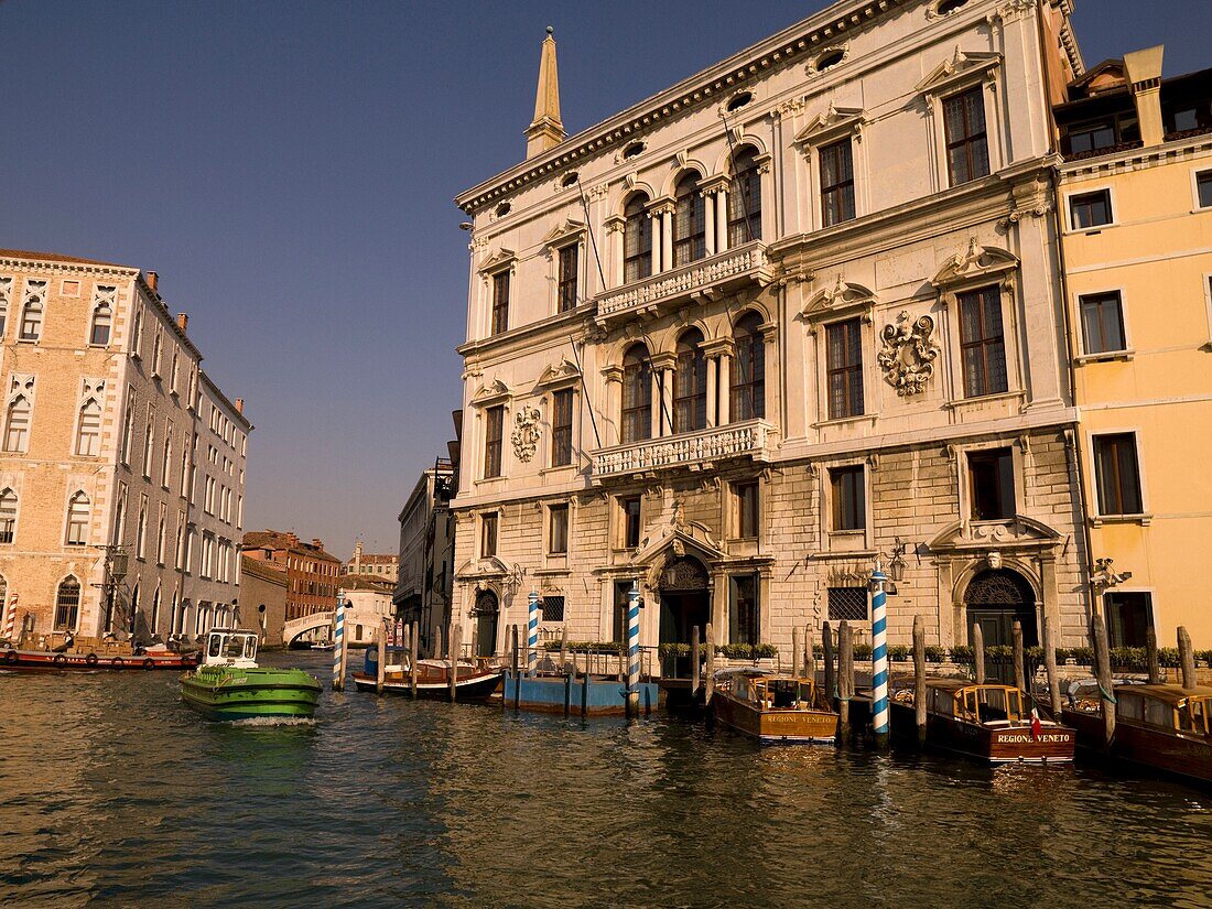 Boats Moored In Front Of Buildings; Grand Canal. Venice, Italy