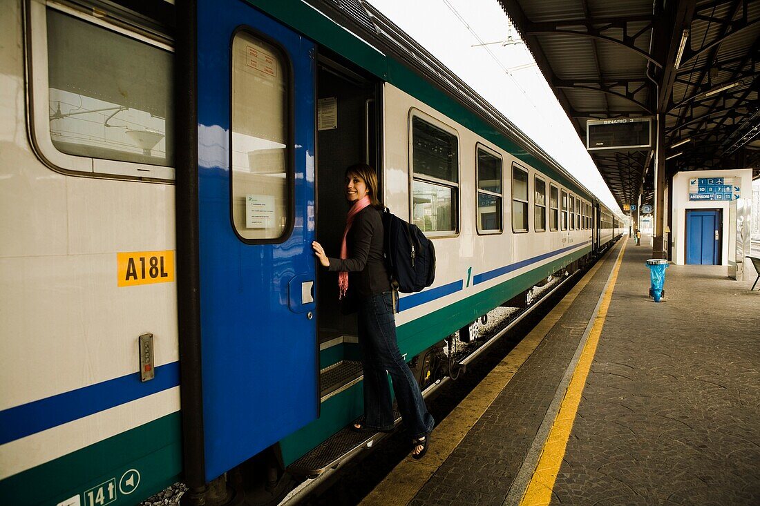 Woman Entering Train; Verona, Italy