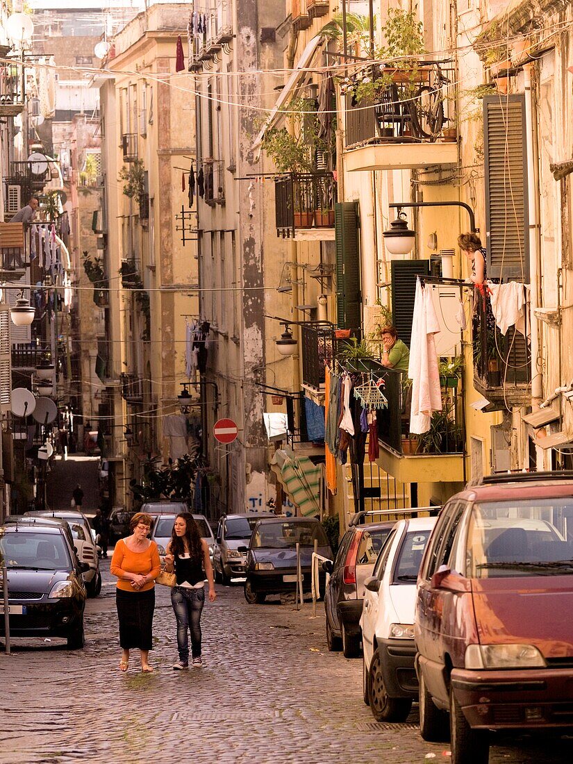 Two Women Walking On Street; Naples, Italy