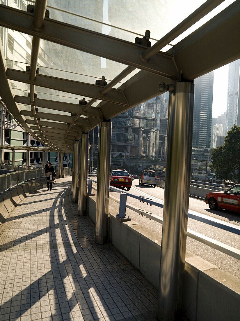 Man Walking On Overpass In Kowloon District; Asia