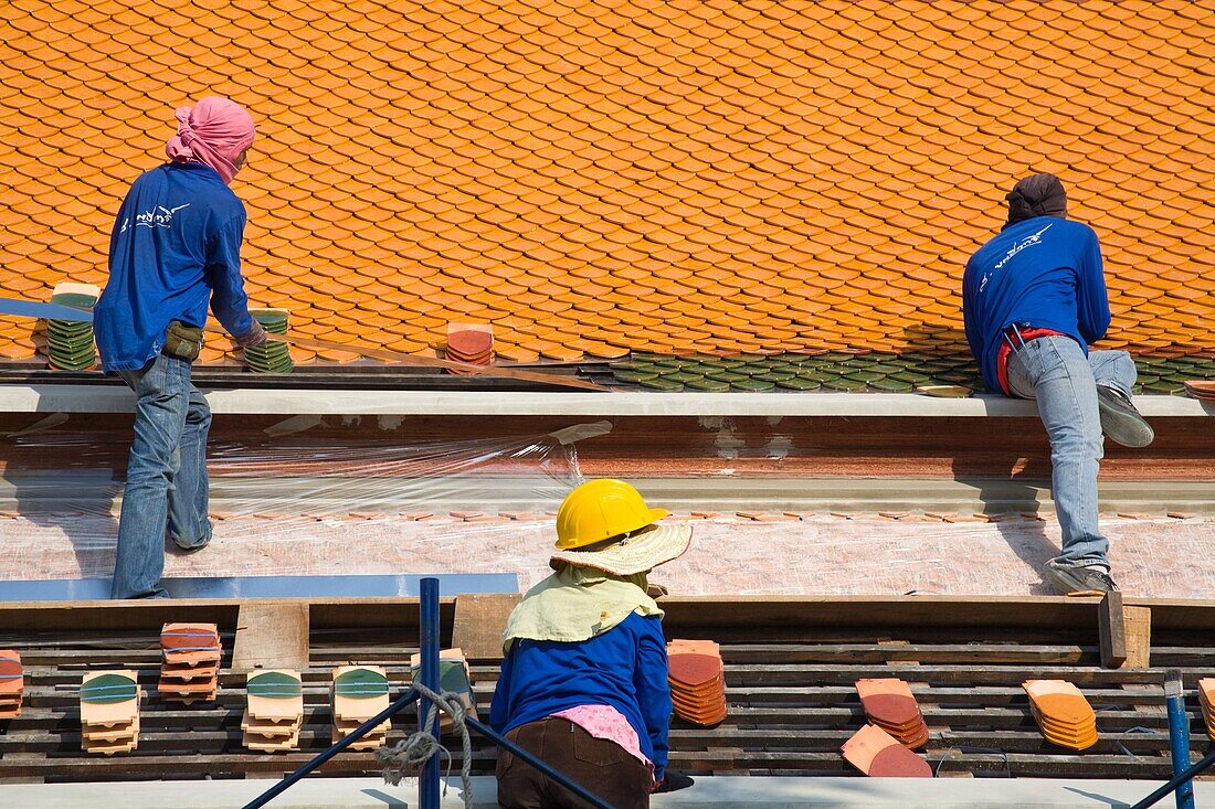 Men Repairing Roof Of Wat Pho Temple In Rattanakosin District; Bangkok, Thailand