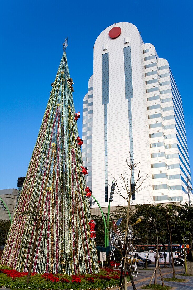 Christmas Tree & We Are Family Tower On Xinyi Road; Taipei, Taiwan, Republic Of China