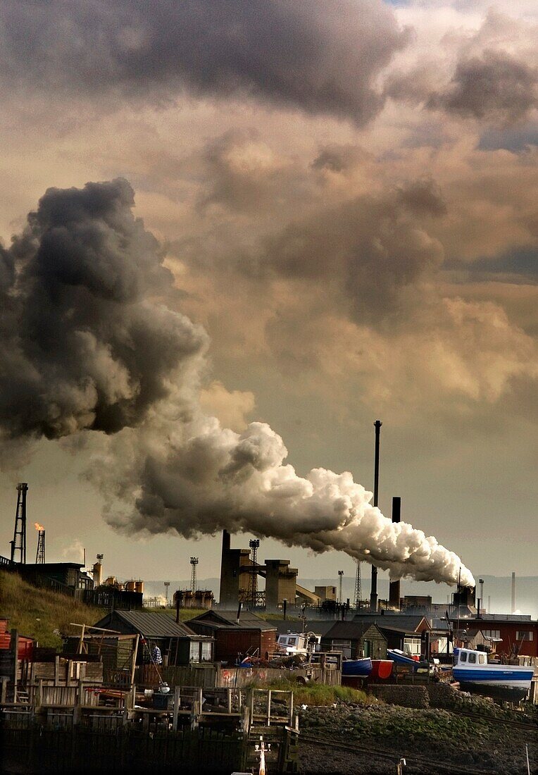 Black Smoke Emitting From Factory Smokestack