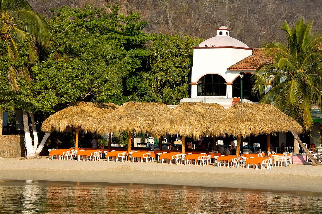 Santa Cruz Beach, Huatulco, Oaxaca State, Mexico; Waterfront Cafe On Beach