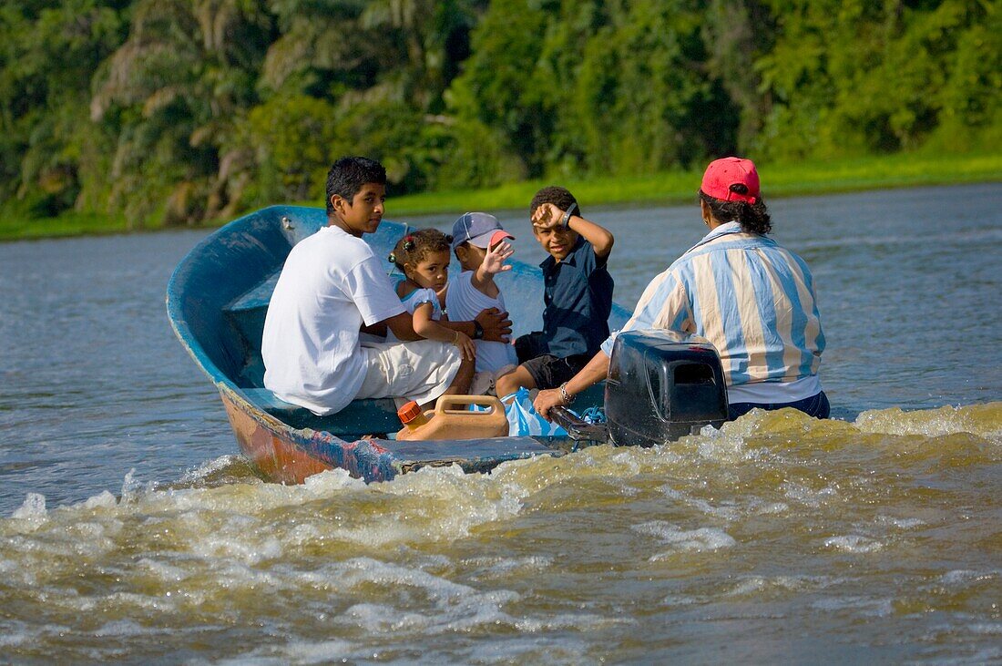 Family Boating In Tortuguero Canal, Costa Rica