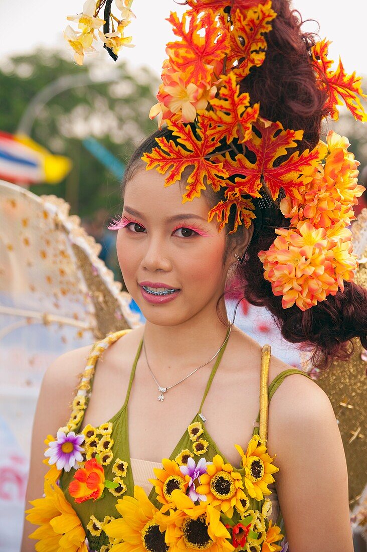 Young Woman Participating In Flower Festival, Chiang Mai, Thailand