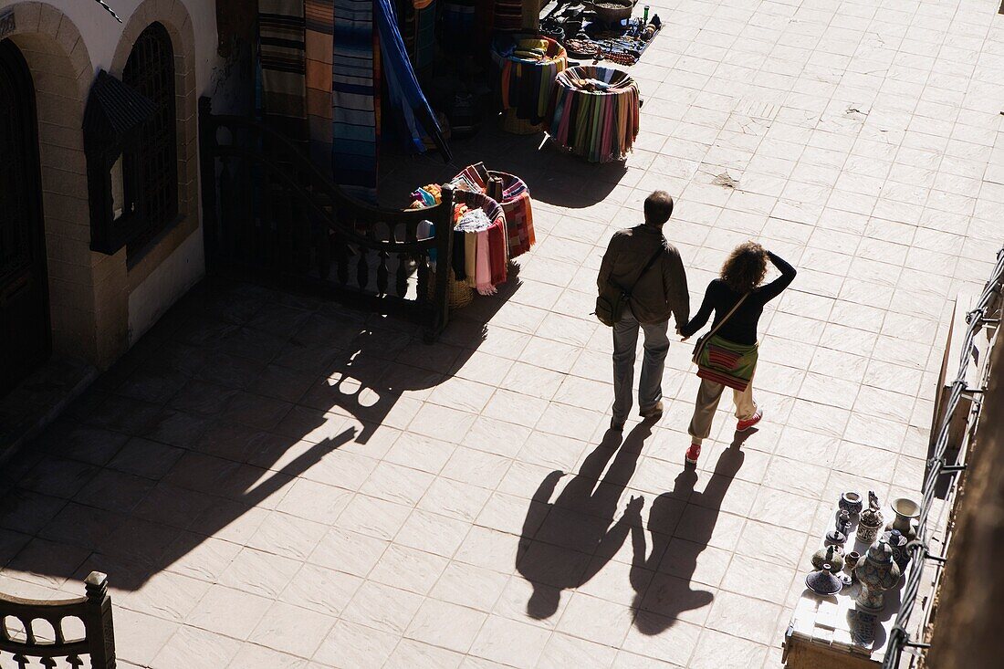 A Couple Walking In The Streets Of Essaouira, Morocco